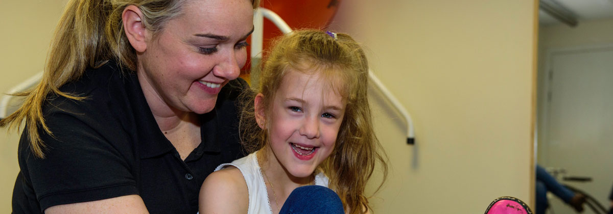 Woman and child in therapy session